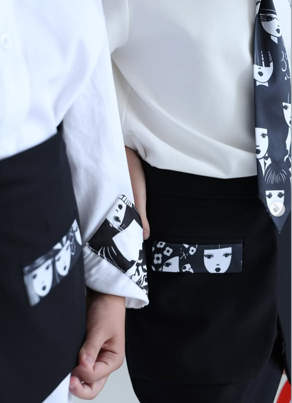 Commercial fashion detail with graphic print trousers
